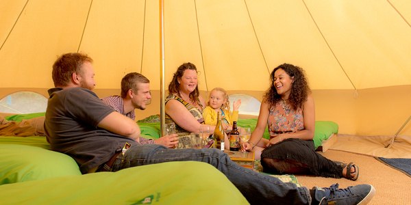 Group sitting in a bell tent at YHA Treyarnon Bay