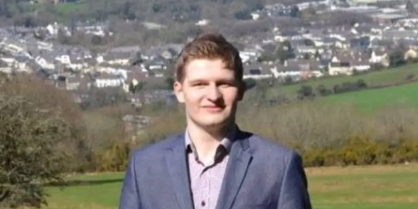 Youth Trustee Caleb Stevens in the countryside